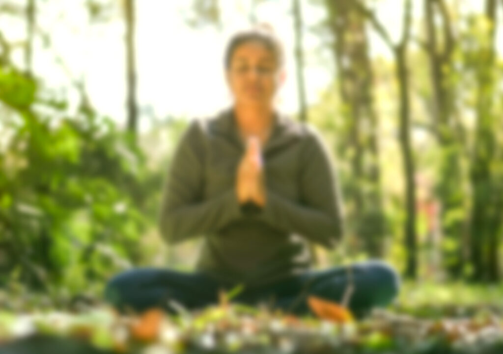 image of woman meditating.  Image by KarinaCarvalho 